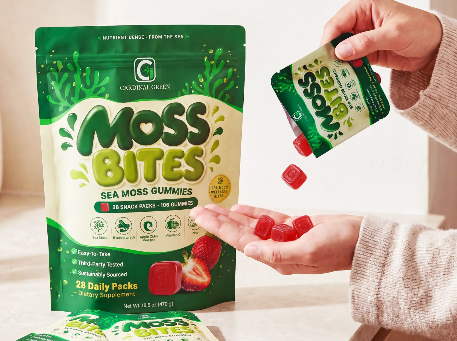A Moss Bites pouch on a kitchen counter while a daily pack is poured into an open hand